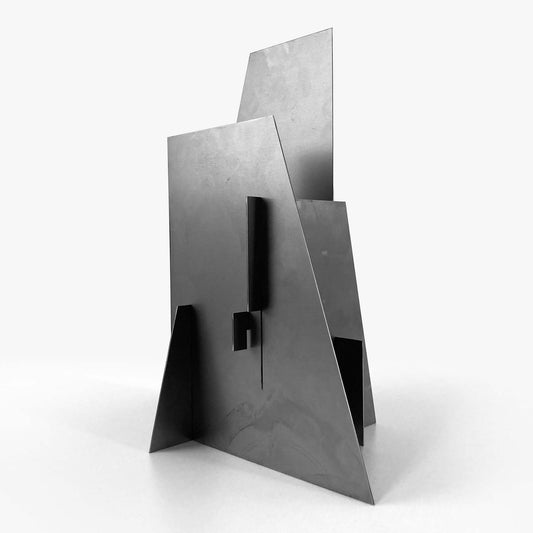 Modern metal sculpture on a white background