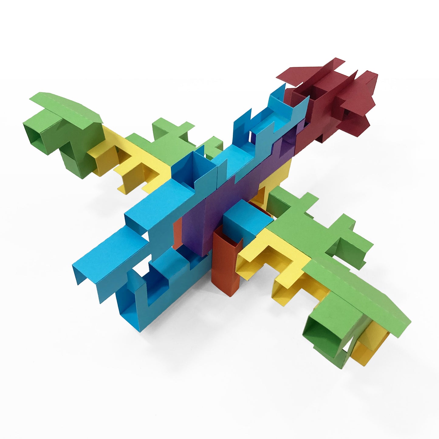 Colorful geometric toy structure i a dragon shape  on a white background