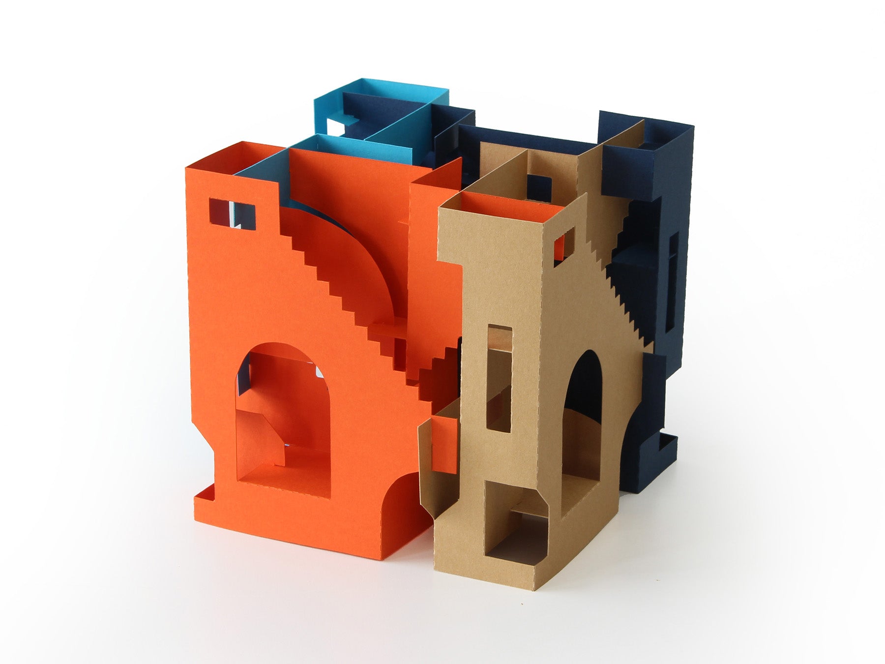 Three-dimensional paper sculpture with blue, orange, and brown interlocking pieces on a white background