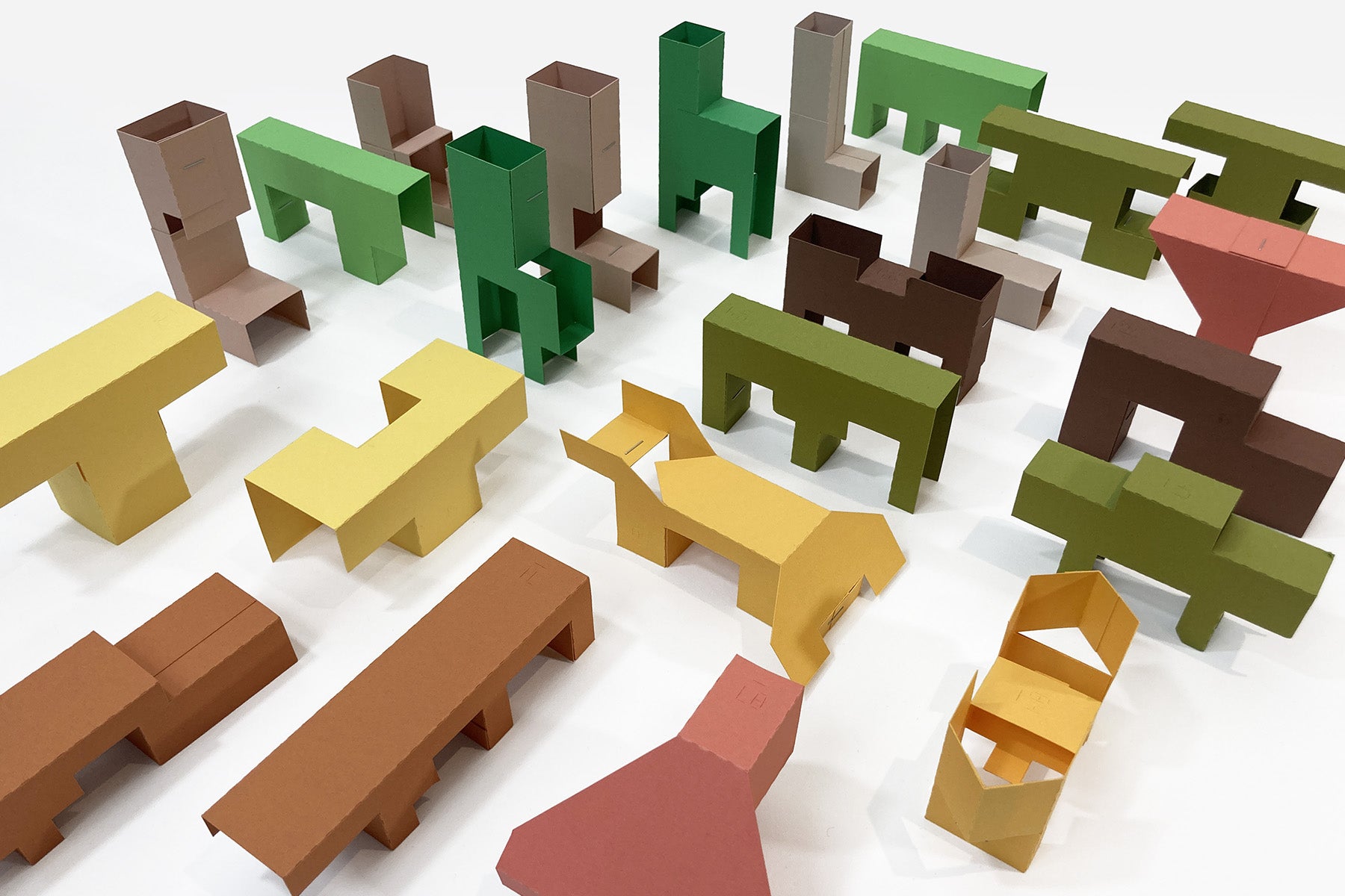 Colorful paper fold modular pieces on a white background